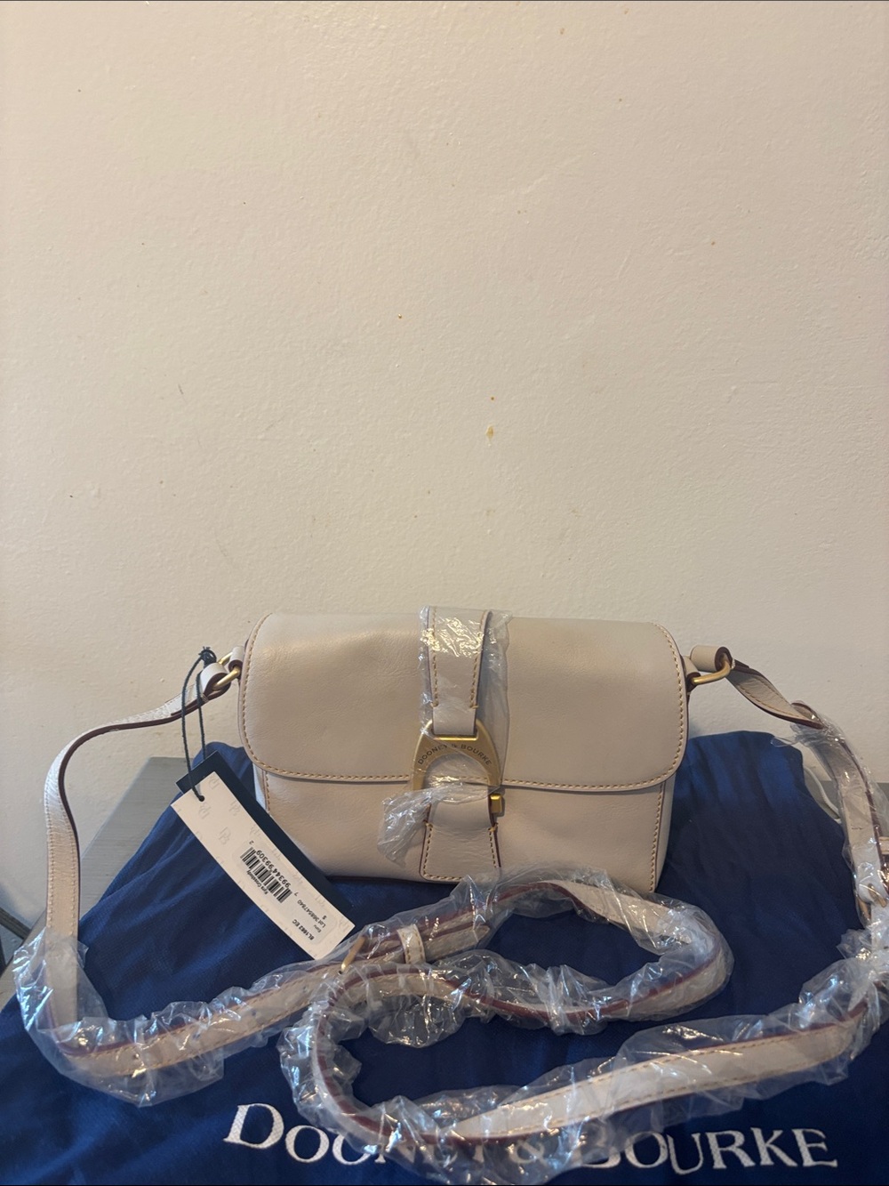 Dooney & Bourke Cream Leather Flap Crossbody with Gold Hardware,Florentine.